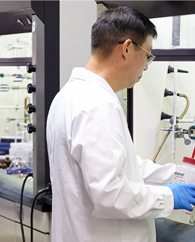 Chemist working in a laboratory at the bench